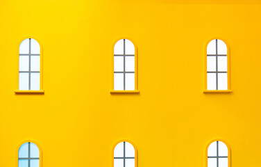 Yellow wall with many windows