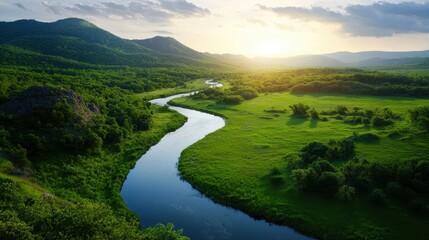 Fototapeta premium A river runs through a lush green valley