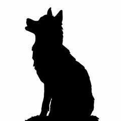 A black dog is sitting on the ground. It has its mouth open. The dog is looking to the left