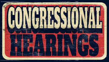 Fototapeta premium Aged and worn congressional hearings sign on wood 