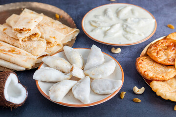 Pitha Pulli is a traditional Bengali sweet made with rice flour, jaggery, coconut, and spices, often steamed or fried.