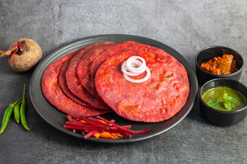 Beetroot paratha is a vibrant, soft Indian flatbread made with whole wheat flour, grated beetroot, and spices. Nutritious and flavorful!