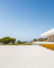Obraz premium Modern architecture near the coast showcases serene outdoor space and clear blue sky
