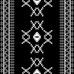 The geometric ethnic pattern of traditional style. Navajo, America Indian patterns. Design for background, wallpaper, clothing, wrapping, Batik, fabric, and prints. Vector illustration.