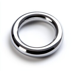 Polished chrome metal ring on white background.