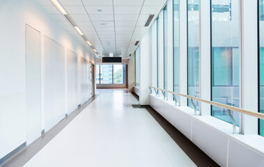 Empty long corridor in modern hospital