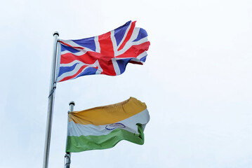 British and Indian flags in the sky