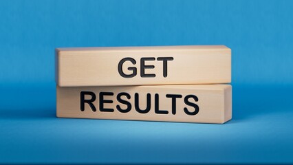 Get results symbol. Wooden blocks with words Get results.Business and Get results concept. Copy space.3D rendering on blue background.