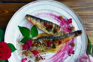 Elegantly plated dish featuring a portion of fish sauce
