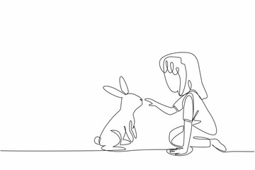 Continuous one line drawing girl sit cross legged and playing with rabbit. Relieve fatigue from studying by playing with rabbit. National Kids and Pets Day. Single line draw design vector illustration