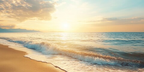Obraz premium Tranquil beach at sunset with golden skies and gentle waves lapping at the shore creating a serene space for artistic inspiration and creativity.