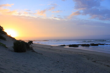 Sunrise by a deserted beach in a secret spot in Africa