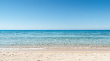 Fototapeta premium A breathtaking view of Karamitsi Beach with its pristine sands and tranquil sea under a cloudless sky.