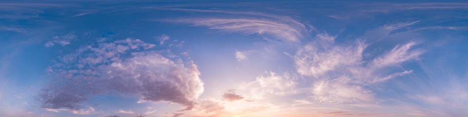 360 panorama of glowing sunset sky with bright Cirrus clouds. Seamless hdr spherical 360 panorama. Sky dome in 3D visualization, sky replacement for aerial drone panoramas. Weather and climate change