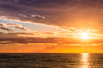 scenic view at beautiful morning beach coastline with orange sand, blue sea water of gulf and beautiful cloudy sky. Nature landscape of wallpaper and backgeound