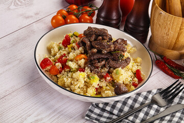 Traditional couscous with beef and vegetables