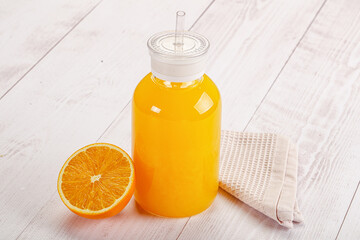 Sweet fresh orange juice in the glass