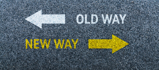 Asphalt road with the text old way and new way
