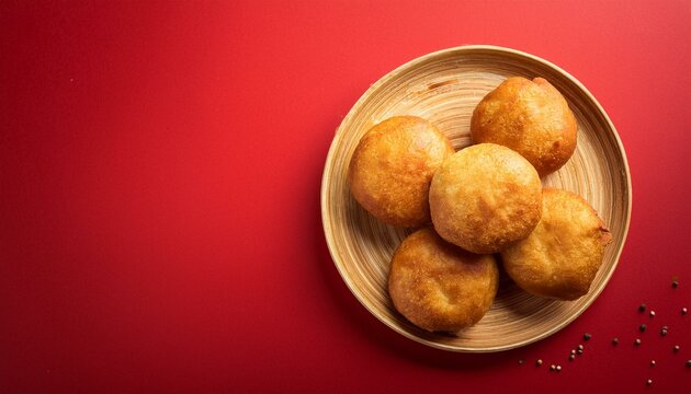 Indian traditional dish kachori on red background