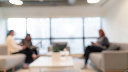 Office Lounge Networking Blur: A cozy office lounge scene with blurred professionals networking in a relaxed atmosphere.
