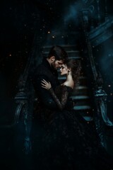 Romantic embrace on a mysterious staircase in a dimly lit setting at night