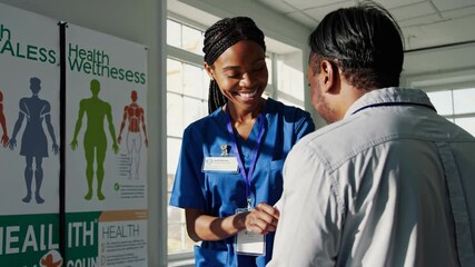 Health and wellness consultation in a clinic with a friendly professional assisting a patient