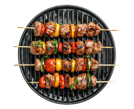 Delicious grilled meat skewers with vegetables on a grill, isolated on transparent cutout background