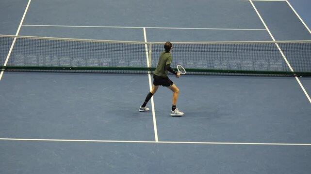 Professional Tennis Player in Action During Match