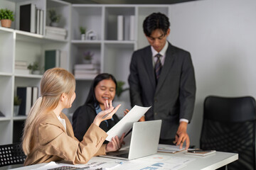 Dynamic Business Team Engaged in a Productive Meeting, Sharing Innovative Ideas and Strategies in a Modern Office Environment