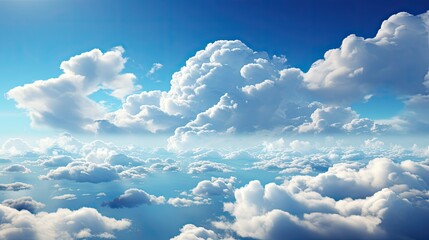 Dramatic closeup of a cloudy sky with fluffy white clouds against a bright blue sky