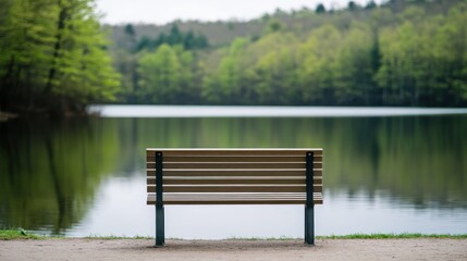 Obraz premium Serene Lakeside Bench Tranquil Park Scene with Wooden Seat and Calm Water
