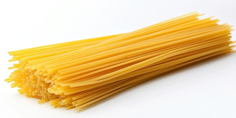 Close-up of uncooked yellow pasta noodles stacked neatly on a clean white background, showcasing texture and vibrant color in a horizontal arrangement.