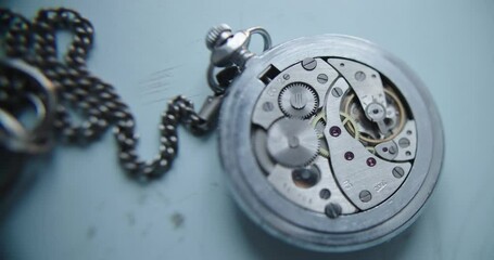 Vintage pocket watch showcases its intricate details and exquisite craftsmanship, admired by many. Soft focus