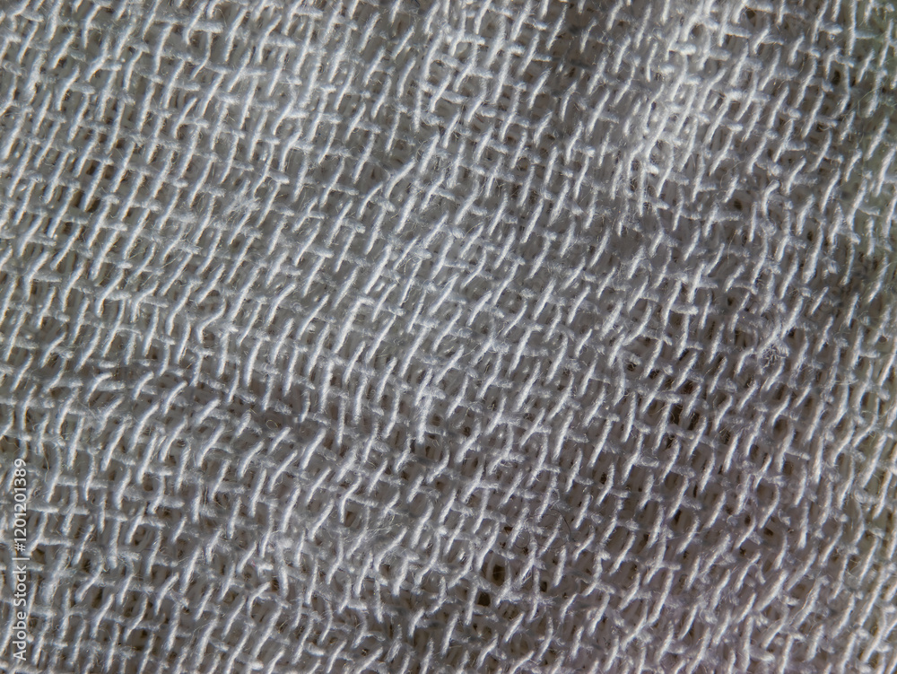 Poster a close up of a white fabric with a pattern of white threads