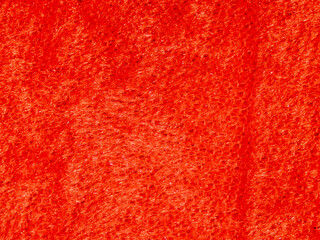 A red background with a red and white striped pattern