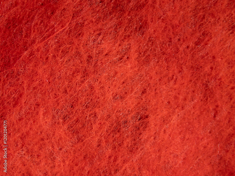 Poster A close up of a red fabric with a fuzzy texture
