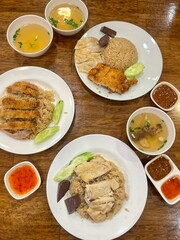 Steamed rice topped with chicken Serve with ginger sauce