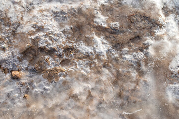 Melting ice opens ground, resources and minerals concept. Top shot. Ecology, melting ice, climate change, global warming concept, Greenland.