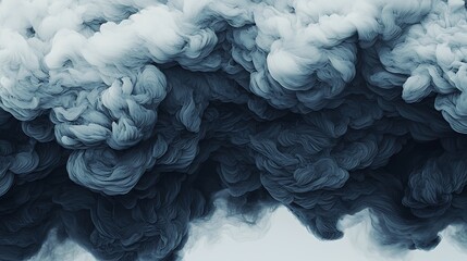 A captivating image of swirling smoke, showcasing a gradient of dark to light tones, evoking a sense of mystery and depth.