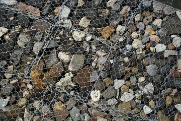Gabion Wire Cages Hosting Rocks for Stabilization and Erosion Control