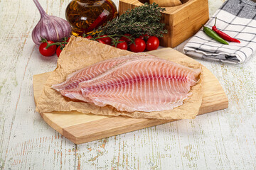 Raw Tilapia fish fillet slice