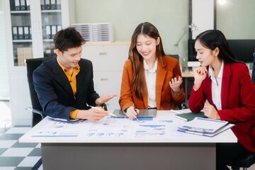 Professional teamwork as business colleagues engage in strategy, planning, and discussion