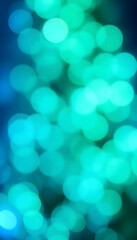 Fototapeta premium Abstract blue and green bokeh background - Christmas or spring concept - Blurred bokeh circles, with white tones