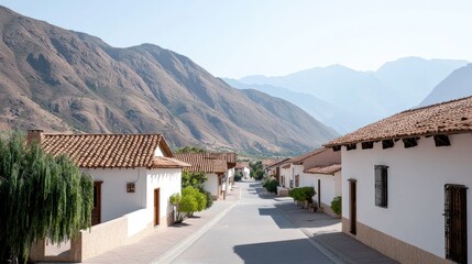 Fototapeta premium Scenic view of a quiet village nestled among mountains.