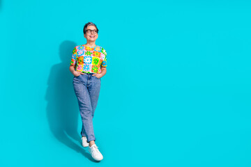 Full size photo of nice aged woman look empty space isolated on teal color background