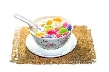 Dessert Thailand gnocchi in coconut milk ready for eat serving on white background and isolate concept.