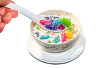 Sweet Thai gnocchi in coconut milk dessert serving on white background and isolate concept.