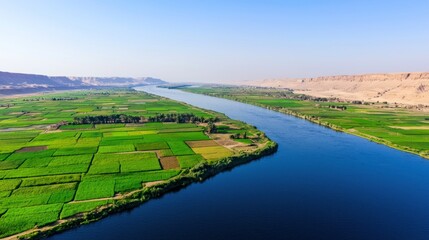 Aerial view of a river flowing through farmland