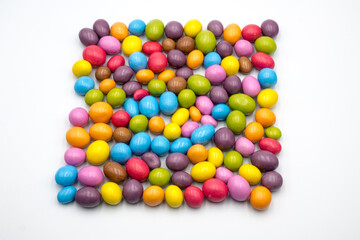 A square made of differently colored candies
