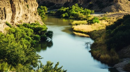 Serene River Winding Through a Picturesque Valley, Lush Greenery and Calm Water Reflections, Natural Landscape, Tranquil Riverbank Scenery